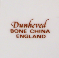 Dunheved China. Hand Painted in Cornwall by Derek Wilson.&nbsp;<br /><br />Derek was trained at Royal Worcester in the skill of 'Painted Fruit' on Bone China. He and his partner Sheila Whitcombe (a Royal Worcester modeller) moved to Cornwall several years ago and set up their business Dunheved China. They specialised in decorating blank china items with fruit designs, birds and animals and some local scenes on plates of various Cornish places.