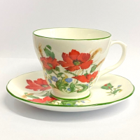<p>Poppies&nbsp;is one of the most popular patterns. It has lovely bright poppies, ears of wheat and small blue flowers. The pieces have a green edging.</p>
<p>Fine Bone China made in England.</p>
<p>It has a classic Victorian style scalloped edge and a subtle embossed feel to suit elegant and fine dining as well as everyday use.</p>
<p>Every item is simply designed but beautifully and carefully crafted, with one standout feature &ndash; a mesmerising translucent characteristic, due to the exemplary quality of the china.</p>
<p>This unique characteristic &ndash; created by the collection&rsquo;s lead-free reflective glaze &ndash; actually enhances the appearance of all food presentation, therefore helping to make all dining occasions that little bit more special.</p>
<p>Duchess English fine bone china represents excellent value for an English made bone china set.<br /><br /><strong>Official UK Stockist</strong></p>