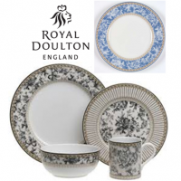 <p class="bodytext">An informal yet stylish pattern, Provence Noir infuses a bit of French countryside into an urban kitchen. The basis of this tableware's design is a fruit and flower pattern imitating French toile fabric but, rather than the usual fresh garden colors, Provence Noir's color scheme is black on ecru with tan accents, providing a chic sophistication to this otherwise sweet classic. A black and tan woven rope border encircles the upper edges of the plates, mug, and bowl while another tan border lines the lower edges. <span>Like the traditional French toile fabric on which it is based, Provence Bleu dinnerware from Royal Doulton depicts florals, stripes, and plaid in a striking blue-and-white scheme. Many of the fine china place setting and serving pieces are available in either a light blue floral print on white, or the reverse for contrast &mdash; a white floral print on dark blue. The mix-and-match patterning exudes a casual, country feel, yet the golden braid design along the borders adds a distinct touch of refinement.</span>&nbsp;Royal Doulton makes the dinnerware and matching baking dishes safe for use in the microwave, dishwasher, oven, and freezer.</p>
<p class="bodytext">Royal Doulton Provence Noir &amp; Bleu were produced from 2002 to 2010.</p>