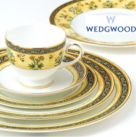 <span>Inspired by the rich cultural heritage of India, the India Collection by Wedgwood is characterized by exotic and alluring design details. This collection is decorated with a motif of exotic blossoms on parchment textured ivory, outlined with pale saffron and contrasted with a dark arabesque border of flowers. A 22-karat rim adds a subtle touch of exotic elegance to this inspiring and romantic dinnerware collection.</span>