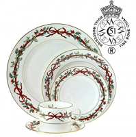 Crafted from fine bone china, Holly Ribbons celebrates the elegance of the holiday season with an understated pattern that coordinates with a wide variety of Christmas decorations. Based upon a Victorian design, a solid white background showcases a thin red ribbon intertwined with sprigs of holly and sprays of celebratory mistletoe. Slender bands of 22-carat gold trim the edges of each tableware piece, adding graceful sophistication to the holiday table.<br /><br />Made in England.