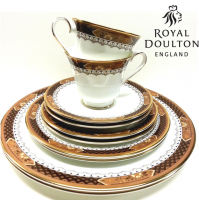 <span>Verona is one of the most elegant and rich patterns by Royal Doulton, with it's chocolate brown and caramel decoration with scroll work. Dainty minimal daisy motifs and just the smallest touch of sunshine yellow.</span><br /><br /><span>The gilded gold edging adds richness and elevates it for use in fine dining.<br /><br /><span>All our stock is new from the supplier, Royal Doulton.&nbsp;</span><br /><br /><span>*This is a discontinued range so only available while stock lasts.*</span><br /><br /><strong>Offical UK Stockist</strong></span><br /><br />