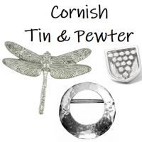 <p>Silk scarves with pewter scarf rings and brooches. All gift boxed.<br /><br />Scarf rings and brooches are made in Cornwall using Cornish pewter.</p>